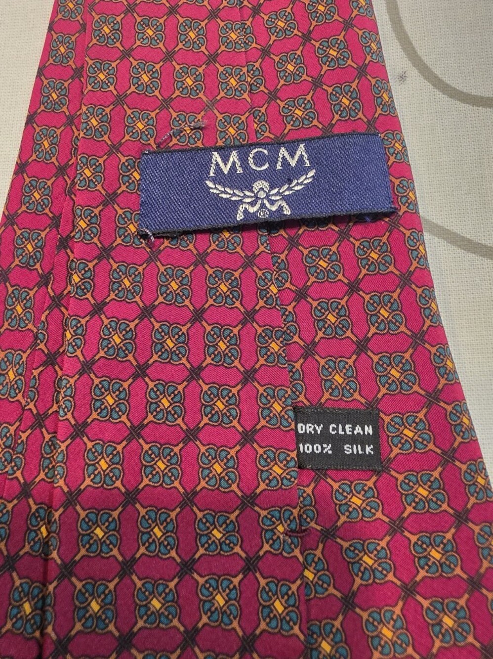 MCM Fuchsia Geometric Silk Tie with Blue and Orange Accents